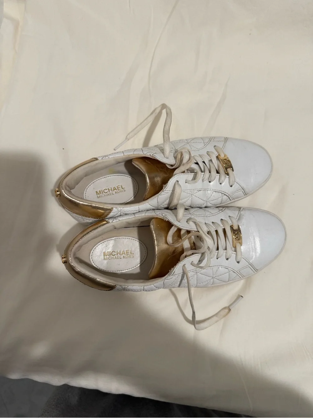 MICHAEL Michael Kors White Quilted Sneakers with Gold Accents